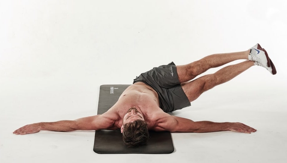 man demonstrating a windscreen wiper abs exercise