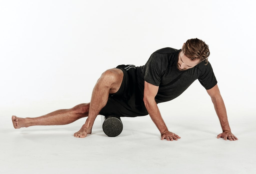 man rolling out Iliotibial band