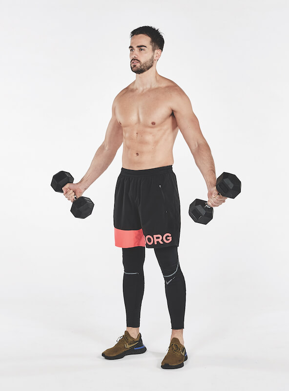 Topless man performing scaption exercise with dumbbells, one of the best workout finishers