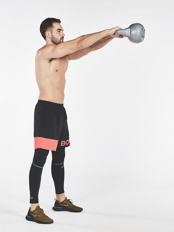 man demonstrates how to do kettlebell swing exercise