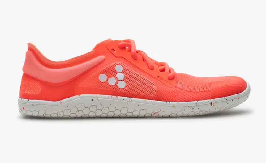 Product shot of a red Vivobarefoot Primus III running shoe