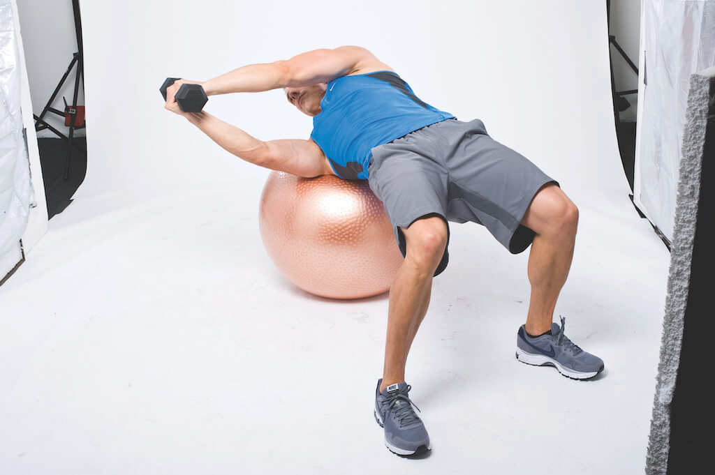 The Dumbbell Gym Ball Workout To Amplify Your Abs Workout – Men's Fitness UK