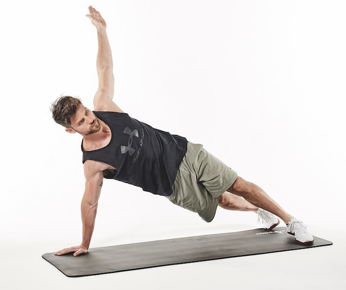 man demonstrates t press up in 30-minute fat loss workout