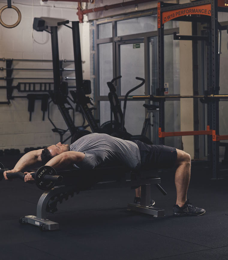 Man demonstrating a EZ-Bar Pull-Over