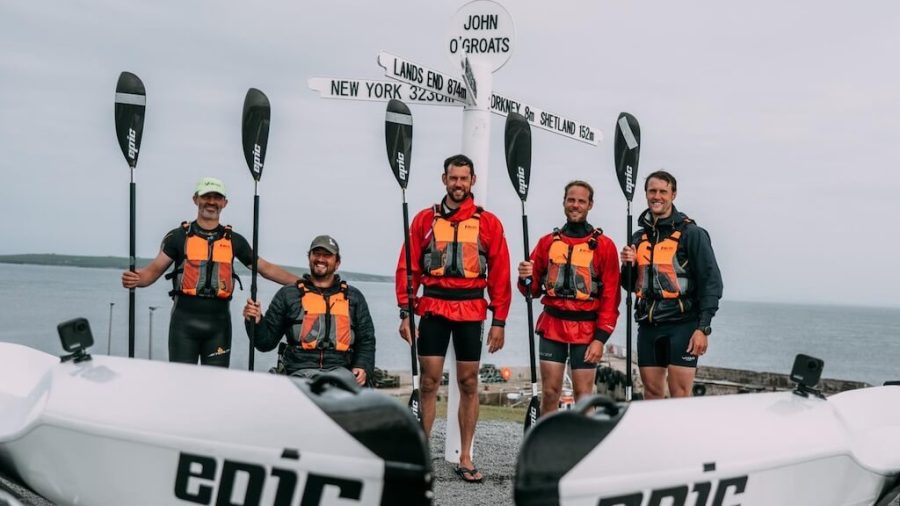 Kayak 4 Heroes finishers stood at the finish line