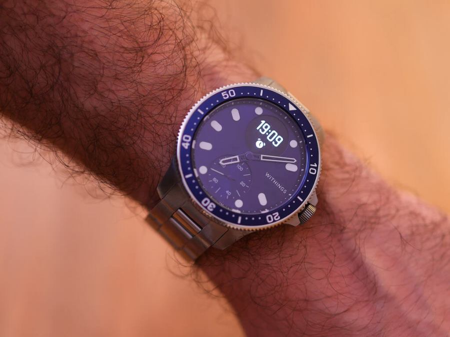 man wearing Withings ScanWatch Horizon smartwatch on wrist