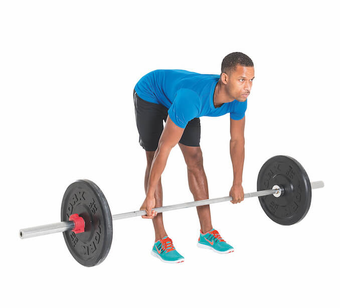 man performing stiff-legged deadlift as part of the Men's Fitness cover model workout plan