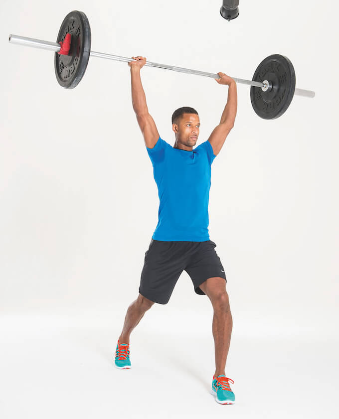 man performing second stage of barbell jerk