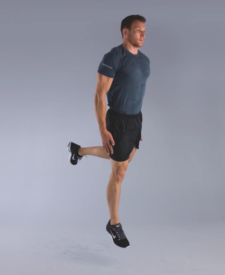 bodyweight hiit workout: man performing single-leg burpee