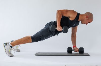 Man performing end of renegade row