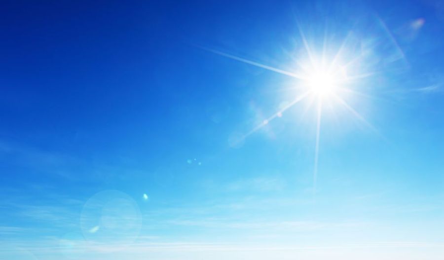 bright sun in clear blue sky