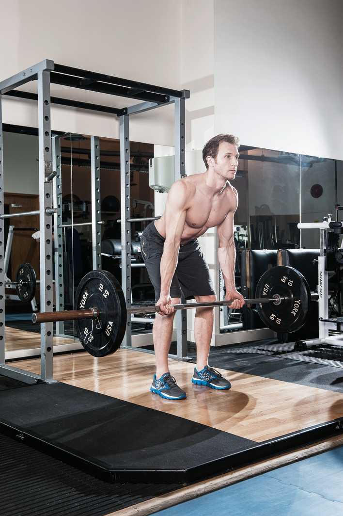 man demonstrates how to do reverse grip row to build back muscles