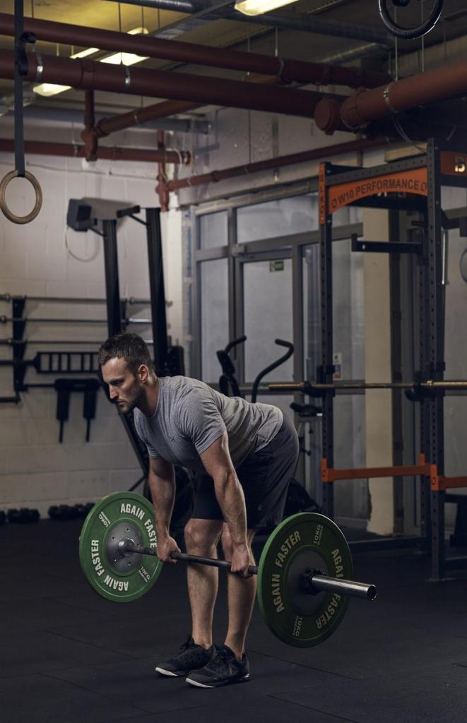 man demonstrating romanian deadlift