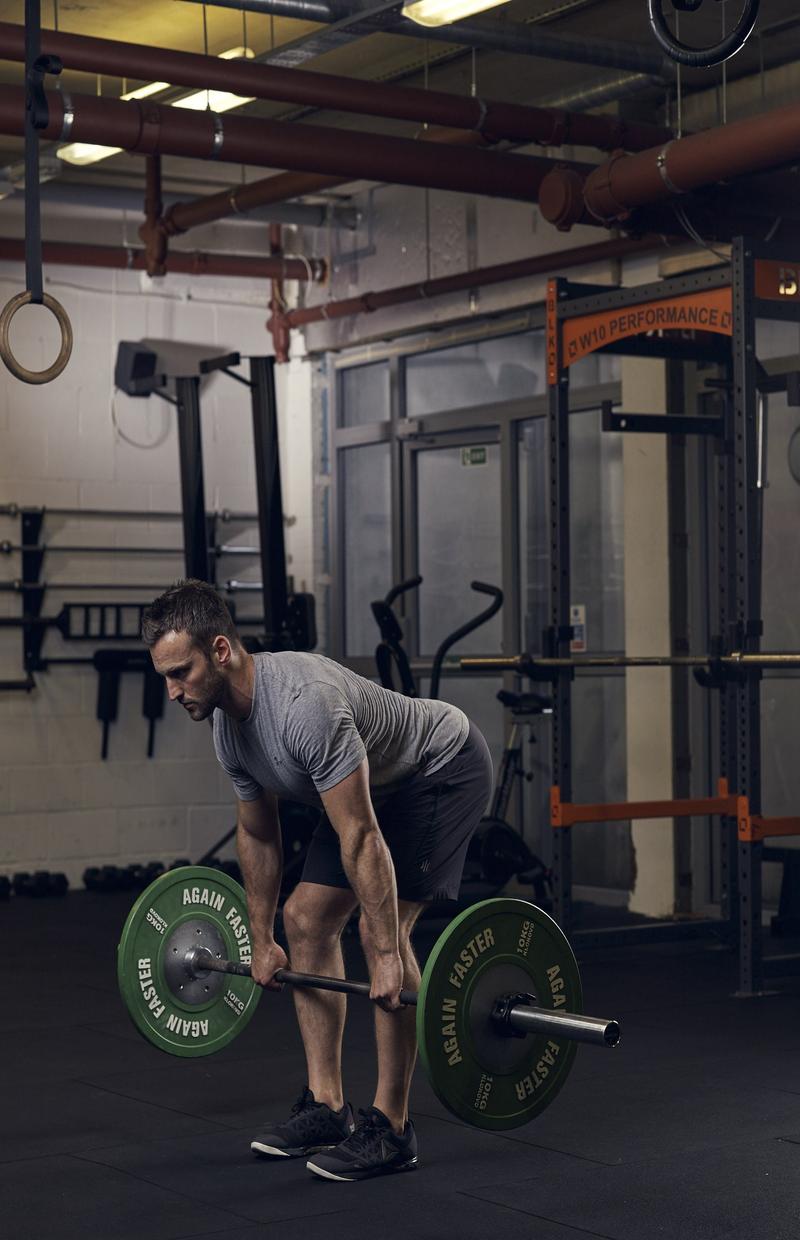 man demonstrating bent over row 