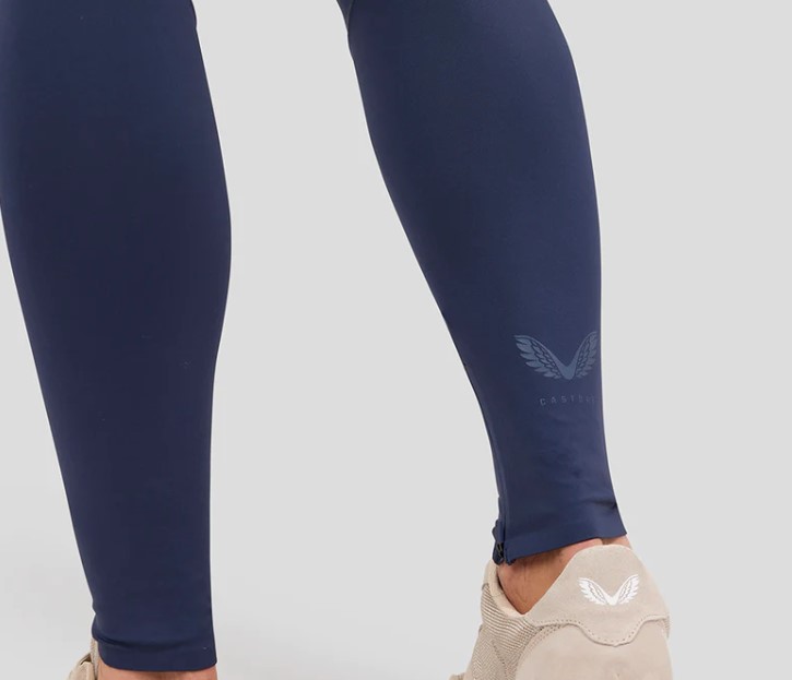 The calves of a man wearing Castore Indigo compression tights