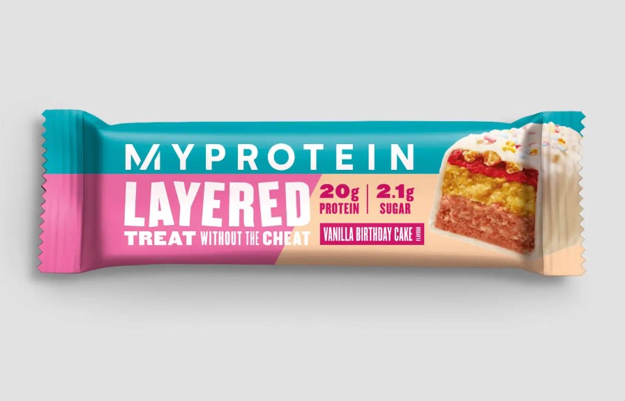 A Myprotein layered vanilla birthday cake slice