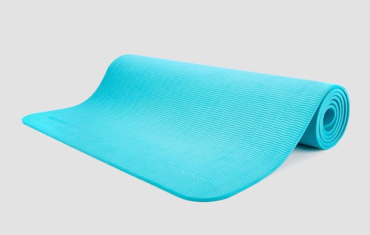 A partially rolled up Myprotein Yoga Recovery Mat