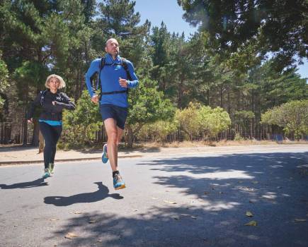 Male and female runner running in 361 degrees running shoes