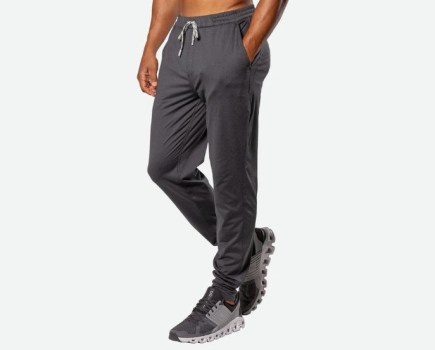 Lower torso of a man wearing gym joggers