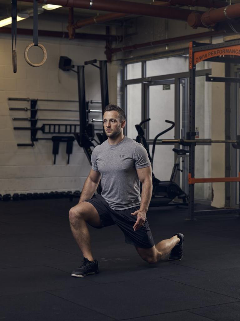 man demonstrates jump lunge