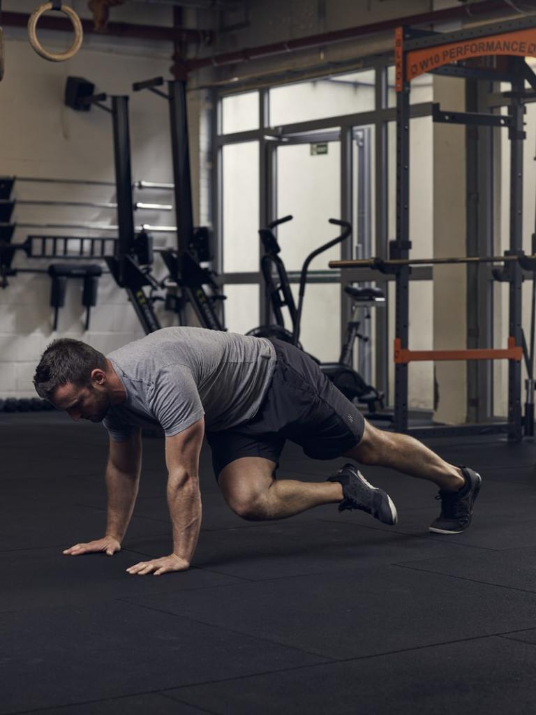 man demonstrates mountain climbers