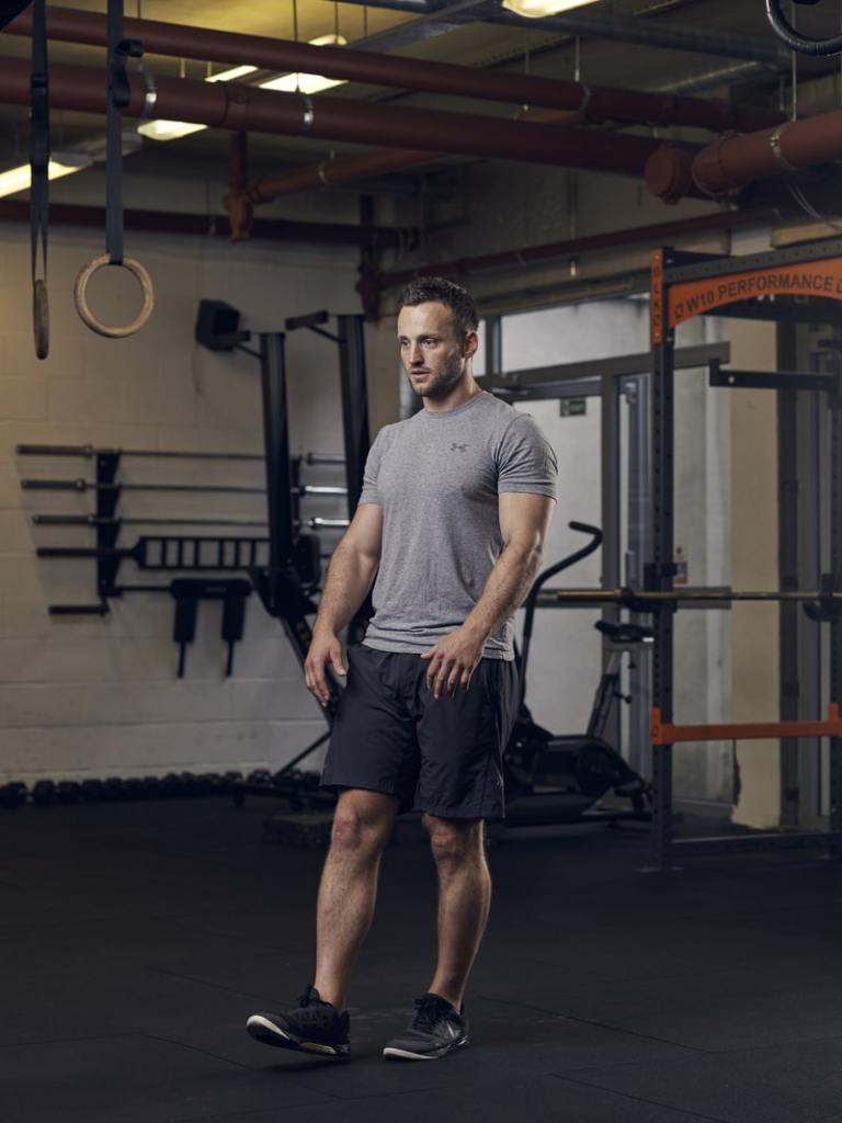 man demonstrates pistol squat