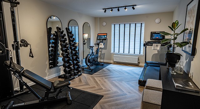 home gym with various exercise machines