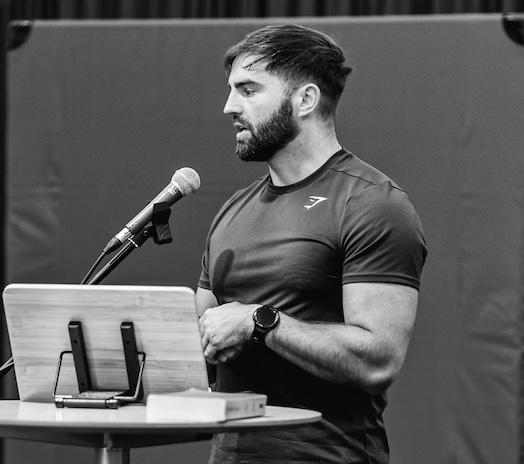 Rage Fitness founder Craig Brown gives a speech