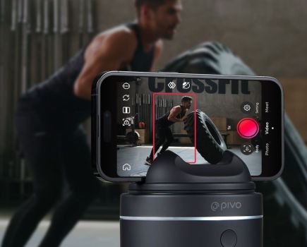 A CrossFit athlete being filmed on a mobile phone