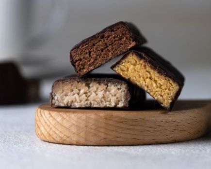 Chopped-up protein bars on a chopping board