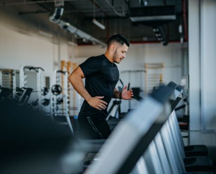 Man running on a treadmill