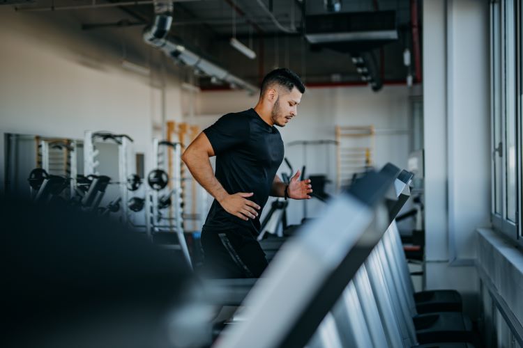 Man running on a treadmill