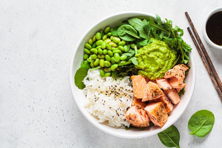 Overhead view of bowl of salmon and rice