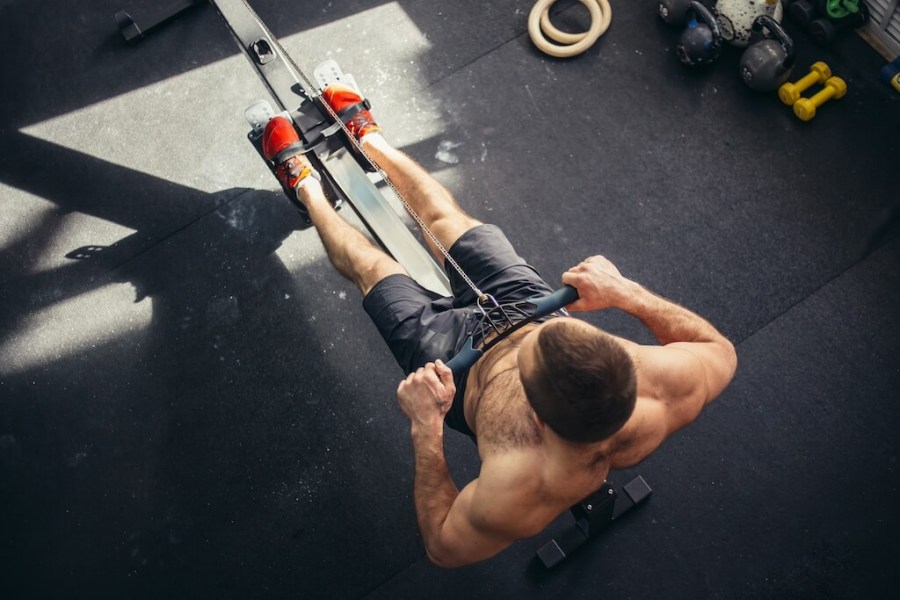 top down view of man on rowing machine