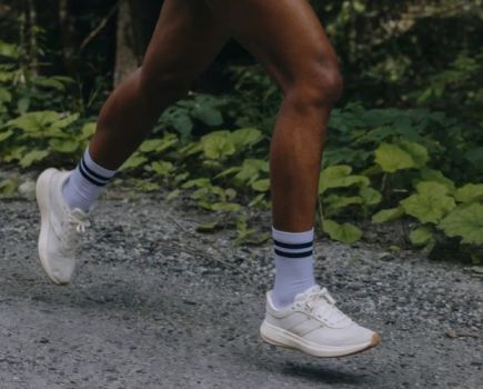 Close-up of a man's feet running