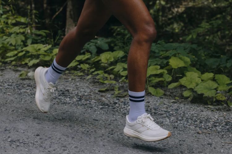 Close-up of a man's feet running