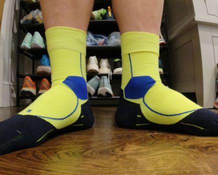 Close-up of a man's feet wearing running socks