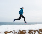 man running in the snow