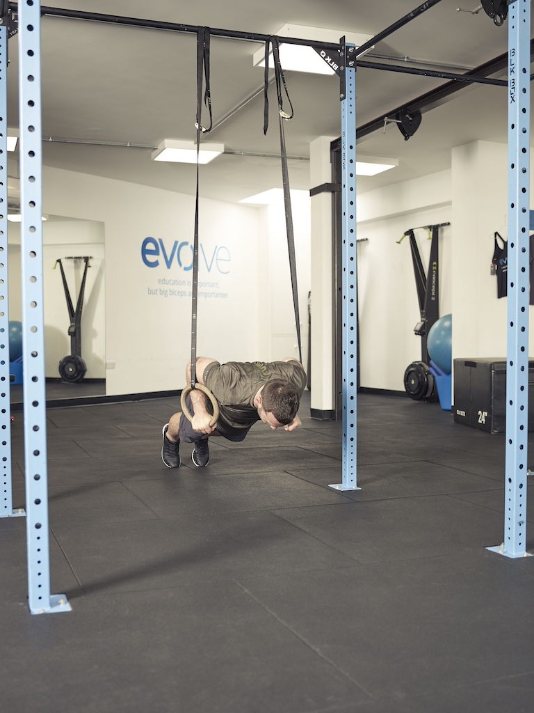 man performing a push-up 