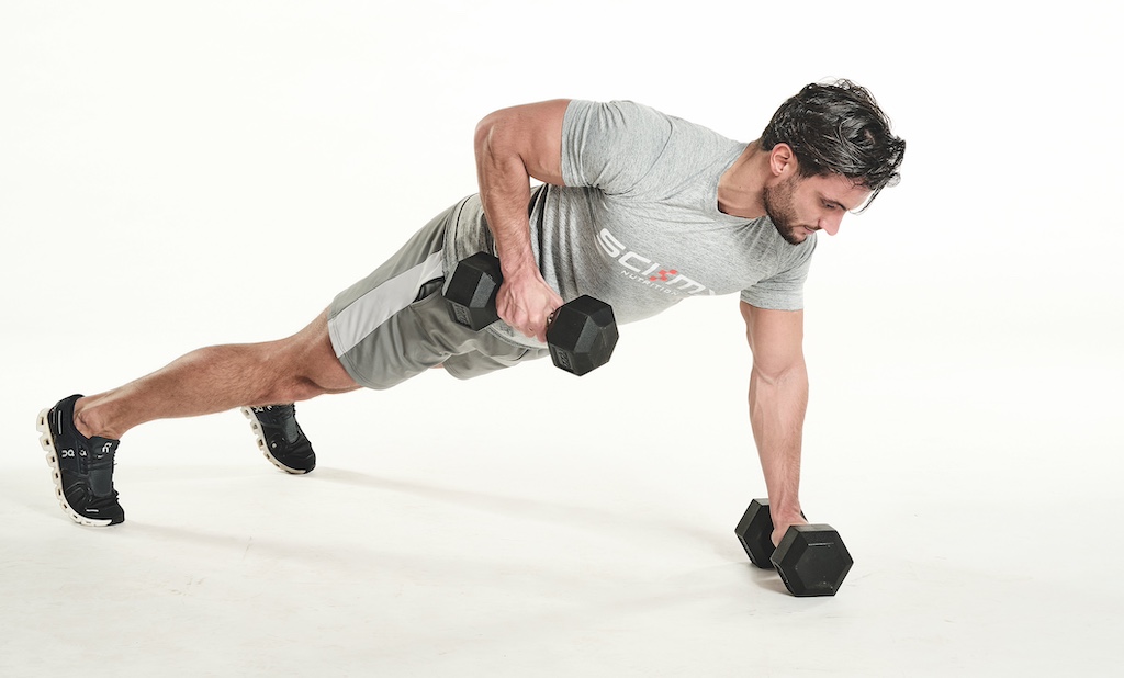 man performing renegade row exercise