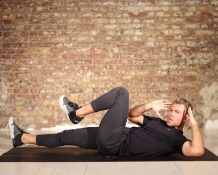 Man performing a bodyweight abs workout