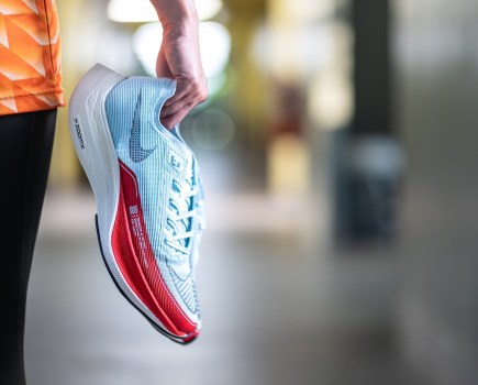 Man holding the Nike "ZoomX Vaporfly Next% 2"