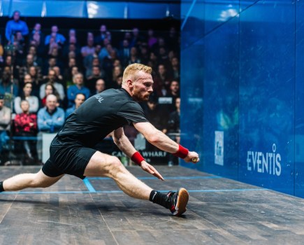 squash player Joel Makin lunges for a ball