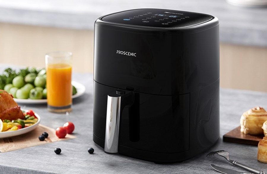 Product shot of an air fryer on a kitchen worktop