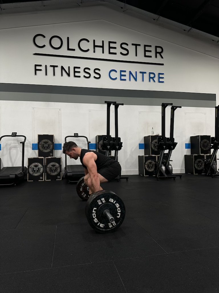 PT Harvey Lawton demonstrating how to do a barbell deadlift