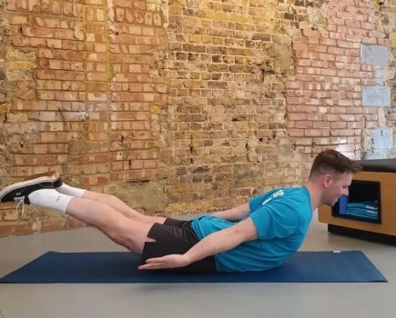 Man performing a mid-back extension stretch