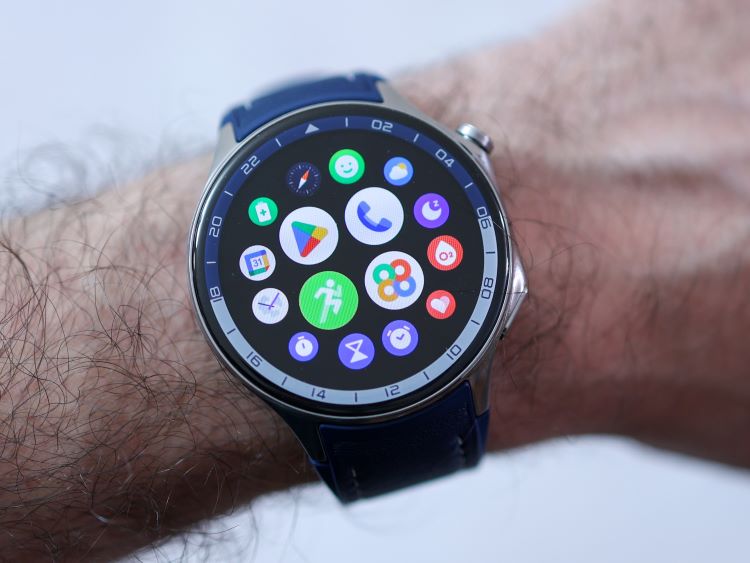 Close-up of a man's wrist and running watch