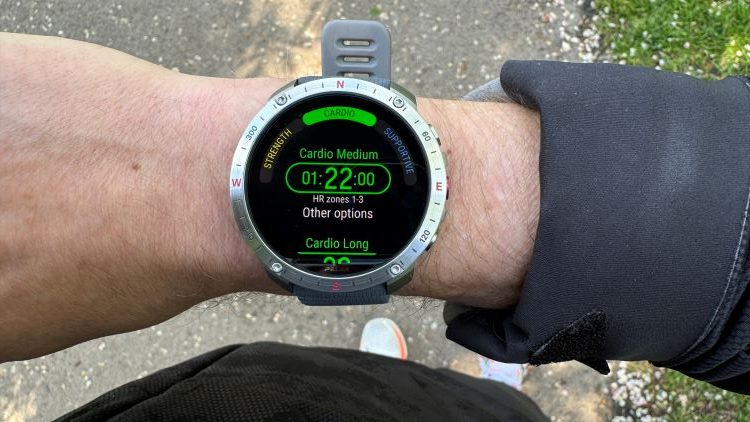 Close-up of a man's wrist wearing a running watch