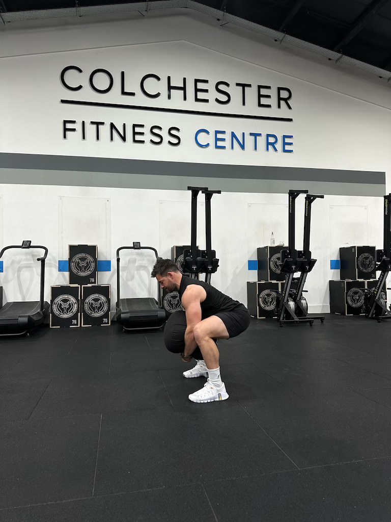 PT Harvey Lawton demonstrating how to do a sandbag clean