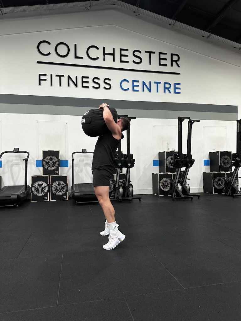 PT Harvey Lawton demonstrating how to do a sandbag clean